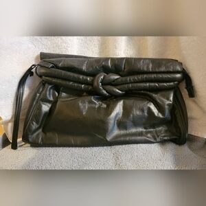Gorgeous-Vintage Stylish black leather clutch purse. Has cool knotted design